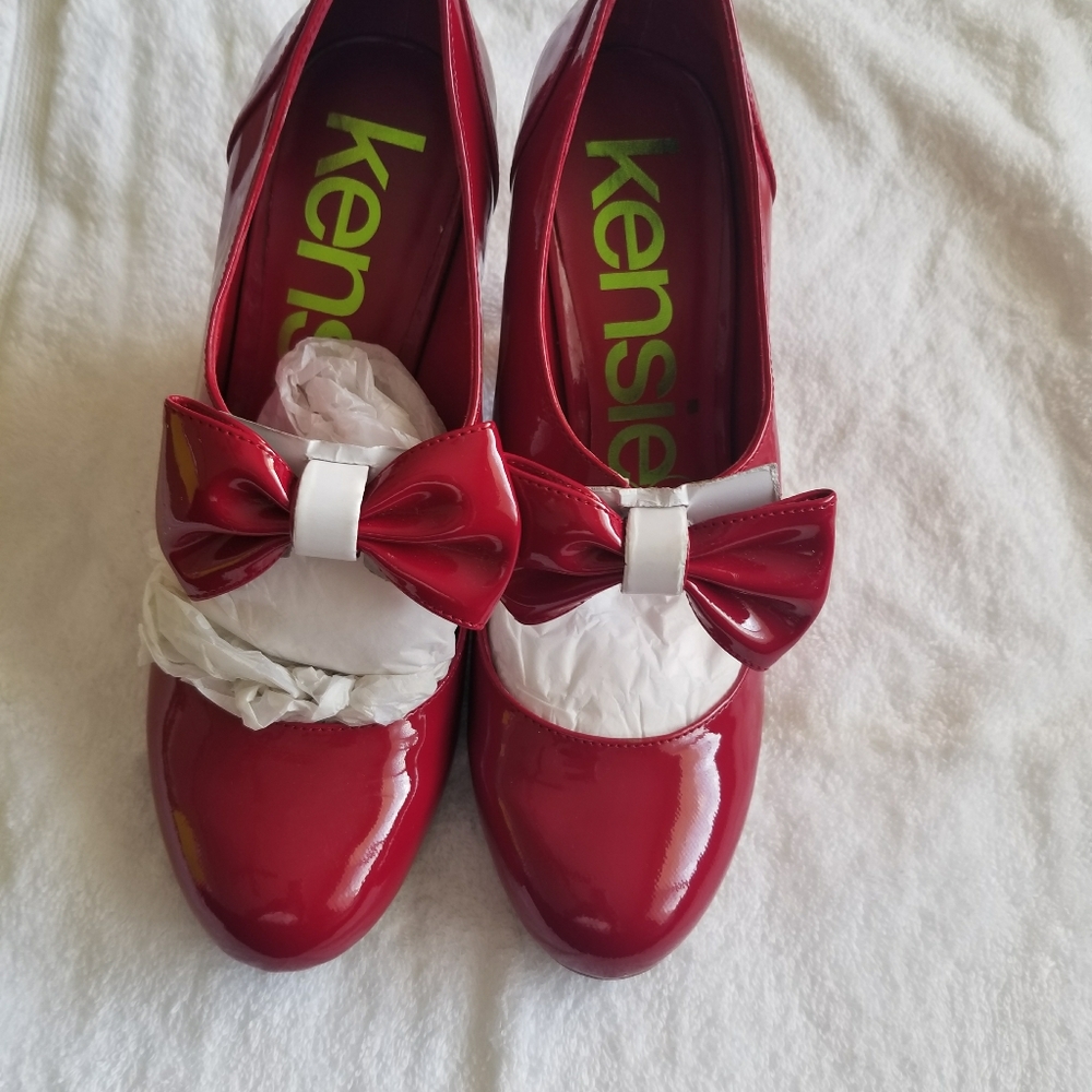 Women's Red Patent shown with bow.